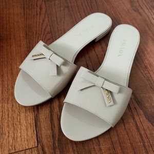 Prada tan patent leather bow slide sandals